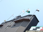野球場・甲子園球場・旗がたなびくスコアーボード