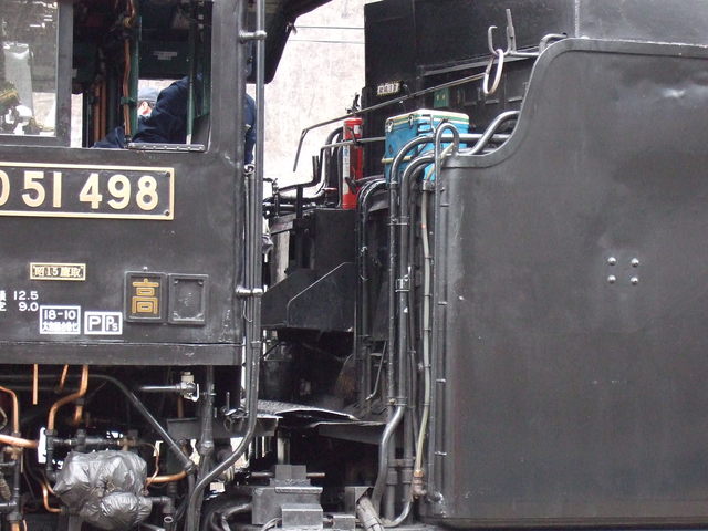 蒸気機関車(SL)のD51・機関車とテンダーの間の部分の写真の写真